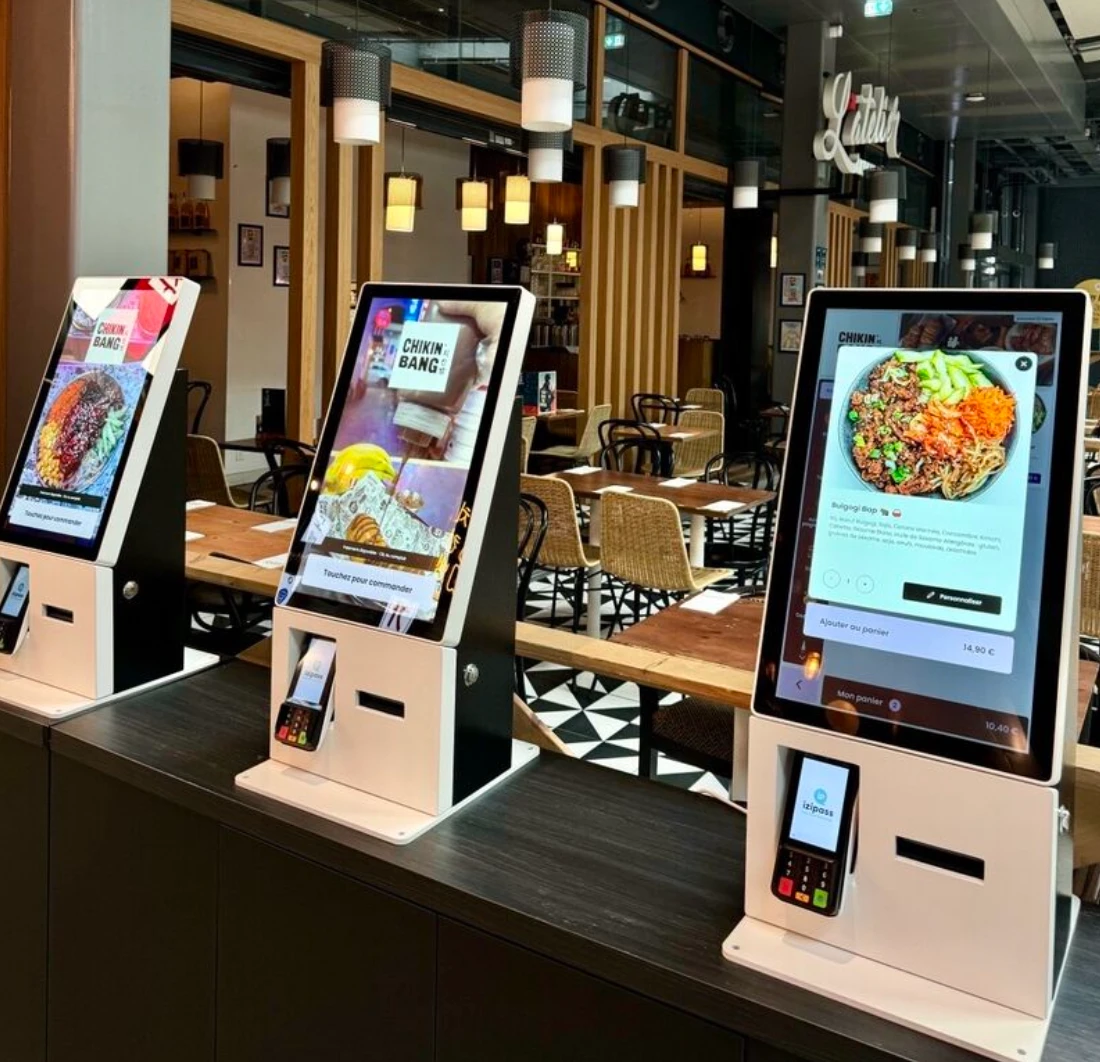 PAX A35 multilane retail PIN pads integrated into self-order kiosk lineup